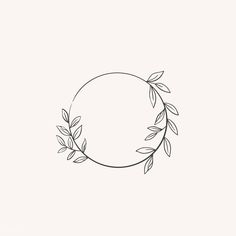 a black and white drawing of a circle with leaves