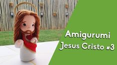 a crocheted doll holding a basket with the words amigurumii jesus christ 3