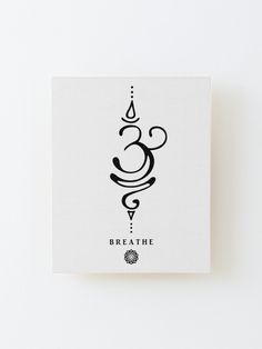 a black and white photo of a logo on a square piece of paper that says breathe