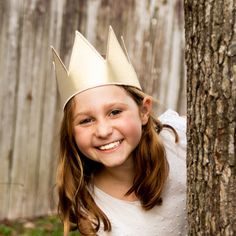 These metallic gold crowns are great for any royal themed event, birthday party, or anyone trying to finish a king, queen, prince, or princess costume.  Each crown is made from metallic twill with embroidered edges.  Crowns have adjustable hook/loop fastening in the back to fit a range of sizes (one size fits most).   OPTIONAL PLUSH SHERPA TRIM - You can choose to have this crown with or without a soft sherpa trim along the bottom. Custom Designs are available upon request. Any Customization/Personalization may require additional fees. Gold Costume Hat With Tall Crown, Royal Gold Crown For Parties, Gold Tall Crown Costume Hat, Royal Gold Party Crown, Gold Crown Costume Hat, Royal Gold Crown With Pinched Shape, Royal Gold Crown With Tall Shape, Royal Gold Tall Crown, Gold Tall Crown Costume Hats And Headpieces