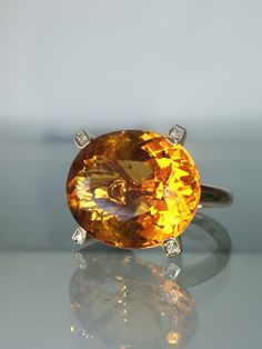 "14k Citrine Statement Diamond Ring, Citrine Ring 14K Yellow Gold, Citrine Oval Cut Ring, Citrine Gemstone Ring Gold, Yellow Engagement Ring ----------------------------------------------------------------------------- Please watch the video of this ring set on my Instagram page at this link: https://www.instagram.com/p/B1j6oN9Huz0/ ----------------------------------------------------------------------------- Citrine Sun SetRing. Just look at that perfect Brazillian orange Citrine VS clear gemst Elegant Citrine Rings With Large Stone, Yellow Engagement Ring, Luxury Citrine Crystal Ring Fine Jewelry, Luxury Multi-stone Citrine Rings, Yellow Citrine Hallmarked Rings, Luxury Hallmarked Citrine Rings, Orange Citrine, Oval Cut Ring, Yellow Engagement Rings