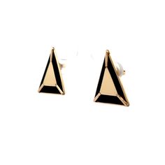 Crafted from polished 14 karat yellow gold, these modern triangle stud earrings feature black onyx. The geometric design of these earrings provides a sleek and trendy look. The combination of the rich yellow gold and deep black onyx creates a striking contrast, enhancing the boldness of the design. The unique triangular shape ensures that these earrings stand out, making them a fashionable addition to any jewelry collection. Elegant Yellow Gold Geometric Earrings, Modern Black Geometric Earrings, Modern Gold Earrings With Black Enamel, Gold Geometric Earrings For Formal Occasions, Black 14k Gold Earrings For Evening, Modern Black Triangle Jewelry, Gold Earrings With Black Enamel In 14k Gold, Modern Black Enamel Earrings For Formal Occasions, Elegant Triangle Earrings For Formal Occasions