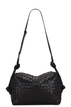 Find BOTTEGA VENETA Medium Loop Shoulder Bag on Editorialist. This Bottega Veneta Loop Shoulder Bag is crafted of Intrecciato nappa leather with a canvas lining. The bag features a top zipper closure, one main compartment, and a single interior zipper pocket. It includes an adjustable and knotted shoulder strap. The bag measures approximately 13 inches wide, 8 inches high, and 5 inches deep, with a 17 inch shoulder strap drop. Designer Pouch Hobo Bag With Detachable Handle, Designer Hobo Bag With Detachable Handle, Designer Woven Leather Satchel Bag, Designer Pouch Hobo Bag, Designer Woven Leather Satchel, Designer Bags With Intrecciato Weave For Formal, Designer Formal Bag With Intrecciato Weave, Evening Pouch Shoulder Bag With Intrecciato Weave, Designer Woven Leather Shoulder Bag For Evening