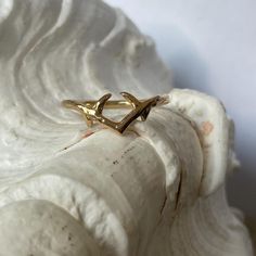 A dainty but edgy wishbone ring with thorn detailing. Available in Sterling Silver and Gold Vermeil.  ~ Jewellery features ~ ~ Ring band thickness 1.6mm Wishbone Ring, Pin Ideas, Ring Band, Rings Statement, Sterling Silber, Gold Vermeil, Band Rings, Statement Rings, Silver Gold