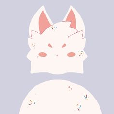 a white cat mask with sprinkles on it's face and ears