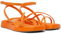 Canvas sandals in orange. · Open square toe · Criss-crossing straps at vamp · Wraparound pin-buckle ankle strap · Logo patch at canvas footbed · Leather-covered midsole · Rubber outsole Supplier color: Orange Orange Strappy Sandals With Heel Strap, Orange Square Toe Sandals For Spring, Spring Orange Square Toe Sandals, Canvas Sandals, Leather Cover, Color Orange, Patch Logo, Ankle Strap, Women Wear