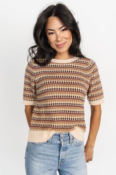 Elevate your fall wardrobe with our new Scout Knit Sweater Top. With a trendy knit design, this is a top you don't want to miss out on! Brown Jacquard Knit Crew Neck Top, Retro Fall Layering Tops, Brown Crew Neck Knit Top For Layering, Brown Textured Knit Top For Layering, Beige Jacquard Knit Top, Beige Knit Top For Fall, Trendy Brown Knit Top For Layering, Trendy Jacquard Knit Tops For Fall, Beige Knit Retro Top