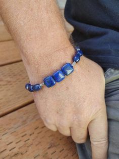 Vibrant Deep Blue lapis lazuli surrounded by sterling silver beads what a sterling silver Lobster Claw clasp. This bracelet measures 8 inches,  but can be resized to fit your needs just message me with the size that will fit you at time of purchase. All of our item come beautifully wrapped in a gift box. Lapis Lazuli Bracelet, Mens Bracelet Silver, Blue Lapis Lazuli, Men's Bracelet, Unisex Bracelets, Blue Lapis, Sterling Silver Mens, Blue Bracelet, Sterling Silver Bracelet