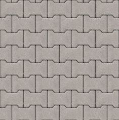 a gray brick wall textured with small squares and rectangles in the middle