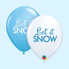 two balloons with the words let it snow written on them, one blue and one white