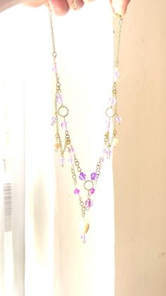 Each charm is carefully crafted and made on a 14.5-inch faux gold chain with an adjustable length.