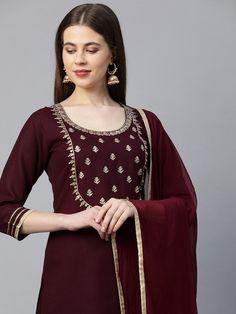 PRODUCT DETAILS Maroon embroidered Kurta with Palazzos with dupattaKurta design: Geometric embroidered Straight shape Regular style Round neck, three-quarter regular sleeves Gotta patti detail Calf length with a straight hem Cotton blend machine weave fabric Palazzos design: Embroidered Palazzos Elasticated waistband Slip-on closure Comes with dupatta Size & Fit Dupatta length: 2.25 metersDupatta width: 95 cmThe model (height 5'8) is wearing a size S Please check the last image above for a compl Embroidered Top Designs, Party Wear Kurta, Ethnic Wear Indian, Gotta Patti, Three Quarter Sleeve Tops, Indian Kurta, Kurta Design, Indian Dress, Weave Fabric