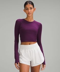 Swiftly Tech Cropped Long-Sleeve Shirt 2.0 | Women's Long Sleeve Shirts | lululemon Lululemon Long Sleeve Breathable Top, Versatile Lululemon Tops, Versatile Solid Color Lululemon Tops, Purple Moisture-wicking Tops For Running, Moisture-wicking Purple Tops For Running, Lululemon Fitted Top With Light Support, Fitted Lululemon Tops With Light Support, Lululemon Functional Tops With Light Support, Lululemon Compressive Go-dry Tops