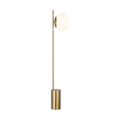 a gold floor lamp with a white ball on it