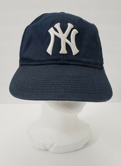 New York Yankees MLB Licensee OC Sports Navy Blue White Embroidered Logo Youth. Condition  is Pre-Owned. Item in good pre owned condition overall. Please see all pictures included before ordering. Shipped with USPS First Class. Classic Blue Baseball Cap For Sports, Vintage Baseball Cap With Embroidered Logo For Sports Events, Retro Blue Baseball Cap For Sports, Blue Retro Baseball Cap For Sports, Vintage Blue Baseball Cap With Embroidered Logo, Vintage Blue Baseball Cap For Sports, Vintage Blue Cotton Baseball Cap, Vintage Cotton Baseball Cap For Sports, Vintage Cotton Baseball Cap For Sports Events