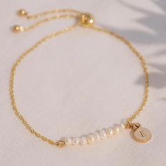 Dainty Pearl Initial Bracelet, Beaded Pearl Bracelet, Personalized Name Bracelet, Minimalist Everyday Wear, 18K Gold Jewelry, Gift for Her - Etsy Minimalist Adjustable Beaded Bracelet For Bridesmaids, Adjustable Minimalist Beaded Bracelet For Bridesmaids, Delicate Beaded Bracelet With Adjustable Chain For Gift, Resizable Pearl Bracelet With Round Beads For Gifts, Personalized Adjustable Dainty Pearl Bracelet, Delicate Jubilee Beaded Bracelet As Gift, Dainty Adjustable Pearl Bracelet Gift, Minimalist Adjustable Pearl Bracelet For Anniversary, Delicate Adjustable Bracelet For Anniversary