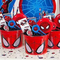 spiderman birthday party supplies in red buckets