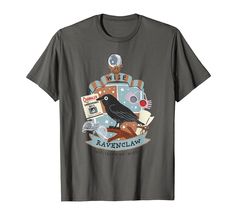 a gray t - shirt with a black bird on it