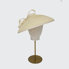 The Dior-style Italian straw percher from the Rachel Trevor Morgan collection is suitable for all occasions such as weddings, garden parties, investitures and racing events. Meets Royal Enclosure size requirements. Set with an elastic. Fits all head sizes. Elegant Adjustable Beige Straw Hat, Elegant Hat With Structured Crown In Natural Color, Elegant Natural Hat With Structured Crown, Beige Structured Crown Straw Hat For Summer, Beige Straw Hat With Structured Crown For Summer, Summer Straw Hat With Structured Crown In Beige, White Elegant Straw Hat, Elegant White Adjustable Straw Hat, Elegant Natural Straw Hat For Garden Party