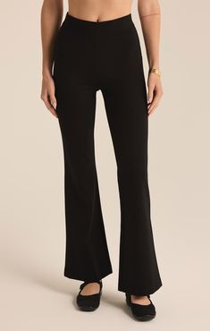 We love a good flare pant and the Do It All Flare Pant has it all! This chic high rise pant features a slim fit throughout the hips, a kick flare, and our fave detail; the supportive feel from the durable, stretchy fabric. Z SUPPLY Women's Do It All Flare Pant, Black, Extra Small Mid-rise Black Yoga Pants For Work, Fitted Full-length Yoga Pants For Work, Black Stretch Flare Jeans For Work, Chic Stretch Flares For Workwear, Trendy Flare Bottoms For Workwear, Chic Flare Yoga Pants, Fitted Wide Leg Flare Jeans, Chic Fitted Flare Jeans For Work, Fitted Black Yoga Pants For Work