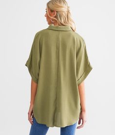 Hyfve One & Only Oversized Dolman Henley - Green Small, Women's Olive Solid woven henley Cuffed sleeves Bust measures 50 on size small Body length 29 on size small. Layering piece(s) and/or accessories sold separately.. 80% Rayon 20% Polyester. Hand wash cold water. Do not bleach. Line dry. Iron low. Do not dry clean.. Measurements: Bust -Fullest part of bust with arms at sides. Waist -Circumference of natural waist: above belly button below rib cage. Hips -Standing with feet together fullest pa Oversized Green Tops For Daywear, Green Oversized Tops For Daywear, Solid Blouse With Rolled Sleeves In Relaxed Fit, Oversized Collared Casual Blouse, Oversized Casual Collared Blouse, Casual Oversized Collared Blouse, Oversized Roll-up Sleeves Blouse For Spring, Casual Batwing Sleeve Blouse With Relaxed Fit, Casual Oversized Top With Roll-up Sleeves