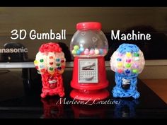 three gumball machines sitting on top of a table next to each other with the words 3d gumball machine