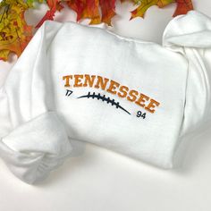 Your new favorite Embroidered sweatshirt is here! -Embroidered Sweatshirt   - Unisex Sweatshirt -Jerzees brand *(Gildan or Port & Co brands may be used to fulfill any back orders that may occur) - Design is 6.8in wide for all  sweatshirt sizes  please message me for any questions. Thank you! School Crewneck Designs, College Sweatshirt Aesthetic, Tennessee Vols Sweatshirt, Varsity T-shirt With Embroidered Graphics For Fall, Collegiate Long Sleeve T-shirt With Letter Embroidery, Sporty Long Sleeve Embroidered T-shirt, White Hoodie With Embroidered Graphics For Fall, Game Day Cotton Sweatshirt With Embroidered Logo, Varsity Sweatshirt With Custom Embroidery For Fall