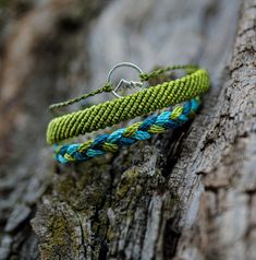 This hiking bracelet set is an adventure gift that any outdoor enthusiast will love. With a nature-inspired mountain bracelets featuring forest green colors, combined with a braided bracelet with contrast turquoise and a flat woven bracelet in grass green, this set is the perfect way to accessorize any outdoor adventure. Make a statement and provide a beautiful reminder of outdoor exploration and wanderlust with these Green life bracelets.  MATERIALS:  -Mountain charm made of alloy and zinc. -Th Hiking Bracelet, Outdoor Exploration, Cord Set, Adventure Gifts, Forest Green Color, Woven Bracelet, Outdoor Enthusiast, Braided Bracelet, Green Life