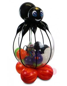 an octopus in a glass ball with balloons