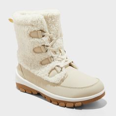 Conquer cold weather in style with these Corie Shearling Hiker Winter Boots from Universal Thread��™. The lace-up boots feature a faux-suede foot and a cozy faux-shearling leg with a 6-inch shaft height, along with a comfy insole and lining to wrap your feet in warm comfort. Set on a treaded outsole, they're suitable for hiking and walking on snowy trails. Universal Thread™: Found exclusively at Target. Women’s Winter Boots, No Heel Boots, Neutral Boots, Boots Target, Target Boots, Hiker Boots, Cozy Style, Shoes Boots Ankle, Rubber Boot