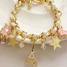 This Bracelet Is So Cute! Perfect For A Christmas Gift :P It Has A Couple Of Different Charms; Heart, Eiffel Tower, Stars, Poker Card, And White Rhinestones. It Has A Toggle Closing. The Length Is About 17cm. Gold Chain Jewelry, Crystal Chain, Bracelet Charm, Gold Jewelry Fashion, Star Charms, Star Pendant, Heart Bracelet, Ankle Bracelets, Leather Chain