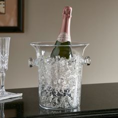 a bottle of champagne in an ice bucket