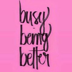 the words busy is being better written in black ink on a pink background with an arrow