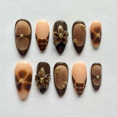 #fyp #brown #brownnails #nails #acrylic #acrylicnaildesigns Brown Designs Nails, Mousse Brown Nails, Brown Nails With Flower Design, Brown Nail Arts, Funky Brown Nails, Choco Mousse Nails, Brown Funky Nails, Brown Junk Nails, Press On Nails Set