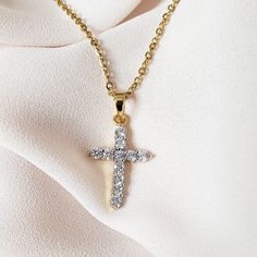 Our Medium Crystal Cross Necklace is the perfect statement piece to add just the right amount of sparkle to your outfit. MATERIAL: 24K gold plating; stainless steel; cubic zirconia crystals ✔ Non Tarnish ✔ Hypoallergenic ✔ Handmade ✔ Quality Guaranteed COLOR: gold