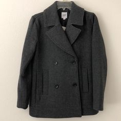 Soft Charcoal Grey Peacoat With Lining. Brand New. Size Xs. Dry Clean Only. Gap Winter Outerwear In Solid Color, Classic Gap Outerwear With Buttons, Chic Gap Outerwear For Spring, Chic Gap Spring Outerwear, Chic Spring Outerwear By Gap, Chic Long Sleeve Gap Outerwear, Gap Outerwear For Fall, Gap Outerwear For Fall Workwear, Chic Gap Winter Outerwear