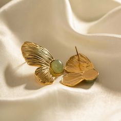 ✦ Add a touch of whimsy and vintage charm to your jewelry collection with our 18K Gold Plated Stainless Steel Stud Earrings. These butterfly stud earrings feature a unique and intricate design that captures the beauty and grace of a butterfly in flight. The 18K gold plating adds a touch of luxury and elegance to these vintage earrings, making them perfect for dressing up or down. The spring-inspired design of these earrings makes them perfect for any season, adding a playful touch of nature to a Gold Nature-inspired Metal Earrings, Nature-inspired Gold Earrings For Anniversary, Vintage Jewelry With Plating For Gift, Vintage Plated Jewelry As A Gift, Vintage Plated Jewelry For Gift, Vintage Tarnish Resistant Brass Earrings, Butterfly In Flight, Butterfly Stud Earrings, Elegant Gothic