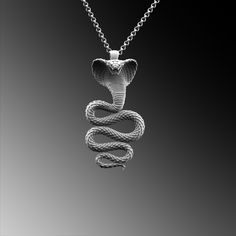 This expertly crafted Silver Cobra Serpent Pendant necklace casts a spell of captivation on all those who wear it! A bold piece for anyone who loves Mythical Jewelry . Buy for yourself or give it as a gift for that special someone in your life! ★Item Details ◆ Material : 925K Sterling Silver ◆ Pendant Height : 1.18 inch x 3 cm ◆ Bail Height : 0.39 inch x 1 cm ◆ Bail With : Suitable for up to  0.19 inch x 5.00 mm Chain ◆ Rolo Chain Thickness : 0.059 inch x 1.5 mm | Foxtail Chain Thickness : 0.078 inch x 2 mm ◆ Pendant Weight : 19 Grams ◆ Rolo Chain Weight : 18 Inches - (45cm) = 4.50 Gr 20 Inches - (50cm) = 5Gr 22 Inches - (55cm) = 5.50 Gr 24 Inches - (60cm) = 6.05 Gr 26 Inches - (65cm) = 6.60 Gr 28 Inches - (70cm) = 7.12 Gr ◆ Foxtail Large Chain Weight / 28 Inches - (70cm) : 15 gr ◆ Chain T Mythical Jewelry, Odd Jewelry, Silver Snake Necklace, Snake Necklace Silver, Unique Gifts For Him, Snake Necklace, Delicate Jewelry, Rolo Chain, Gold Collection