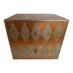 an art deco chest with geometric design on the front