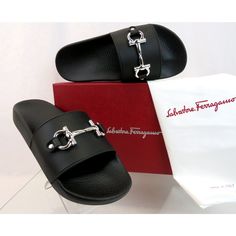 Groovy 11 Black Gancini Bit Rubber Logo Sandals Slides By Salvatore Ferragamo Made In Italy 100% Authentic, Guaranteed! Color: Nero (Print On The Box) Rubber Upper Silver Tone Plastic Gancini Bit At Front Molded Rubber Footbed Logo Rubber Sole Size: 11 M (Print On The Shoe And Box) Original Price: $295 Note!!! These Slides Came From Sf Store In Its Original Box. They Are New But They Are In-Store Item And It’s Possible That Somebody Tried Them On Inside The Store. This Could Cause Tiny Exterior Elegant Black Slides For Summer, Elegant Black Slides For Evening, Designer Slides With Branded Insole For Formal Occasions, Luxury Round Toe Slides For Formal Occasions, Luxury Formal Slides With Round Toe, Luxury Formal Flat Slides, Luxury Black Flat Slides, Black Luxury Flat Slides, Formal Black Slides For Summer