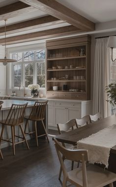 the kitchen is clean and ready to be used as a dining room or breakfast nook