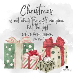 three wrapped presents with the words christmas is not about the gifts we give, but the gift we've been given