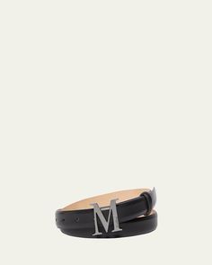 Max Mara belt in leather     Oversized monogram buckle     Hematite hardware     Adjustable fit     Made in Italy Bergdorf Goodman, Max Mara, Leather Belt, Calf Leather, Tops Designs, In Italy, Buckle, Monogram, Italy