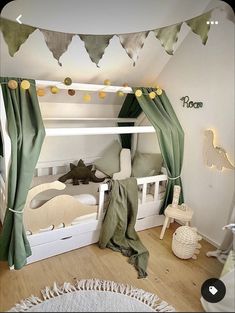 a child's bedroom with bunk beds and green curtains