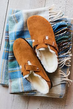 **Fit:** Narrow: A-B Width Classic slip-on Birkenstock open-back clogs in a cozy update, featuring a super soft shearling lining. * Full arch support * To grip * EVA outsole A Birkenstock narrow width fit is comparable to a Medium (B Width). | Boston Shearling Birkenstock at Free People in Tan, Size: EU 39 Boston Shearling Birkenstock, Shearling Birkenstock, Birkenstock Shearling, Boston Shearling, Birkenstock Boston Shearling, Birkenstock Mules, Birkenstock Clog, Clogs Outfit, Free People Store