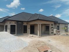 a house under construction in the middle of nowhere