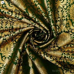 green and gold brocaded fabric