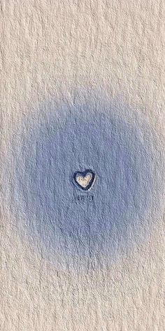 a heart shaped hole in the sand