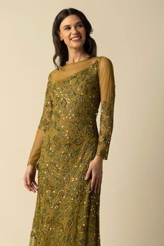 Green gown with golden sequin and beads embroidery in leaf motifs. - Aza Fashions Green Tulle, Gown For Women, Beads Embroidery, Gown Pattern, Green Gown, Leaf Motif, Beaded Neckline, Ladies Gown, Gowns Online