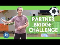 a man standing in front of a soccer ball with the words partner bridge challenge on it